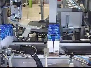 Case loading, shrink bundling, palletization of non-woven pr