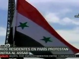 Sirios en París apoyan oposición a Al Assad