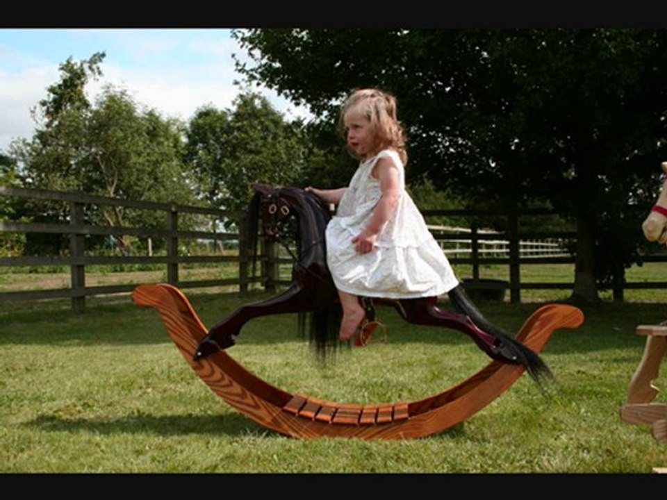 girl on small rocking horse from The Rocking Horse Shop