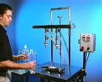 2 Head Overflow Liquid Filling Machine at Sharp Filling Machines