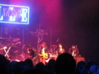 Sara Quin performs with Theophilus London at Elle's 2011 Women In Music Event