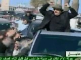 Gaddafi parades through city in open-top car