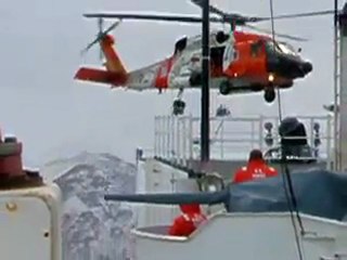 Daily Feed:  Pilot flies helicopter between waves