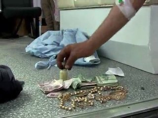 Libya rebels clear bodies of pro-regime soldiers