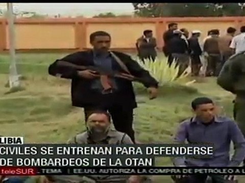 Civiles libios se preparan para defendese de ataques