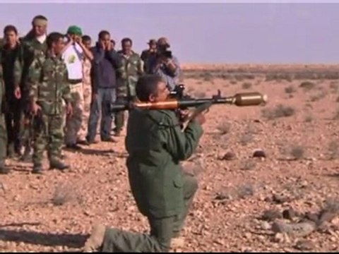 Gaddafi arms civilians