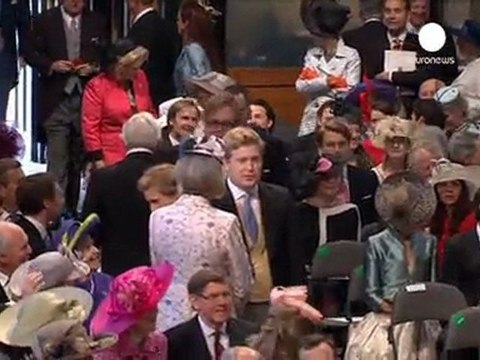 The Beckhams arrive for the royal wedding - no comment