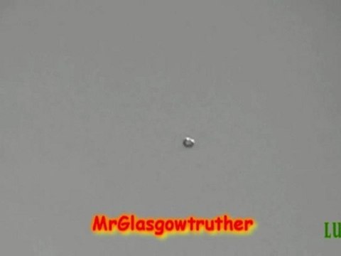 Donut shaped daytime UFO over Glasgow, UK 31-Aug-2010