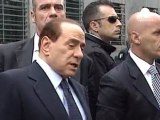 Berlusconi complains court case obstructs his duties