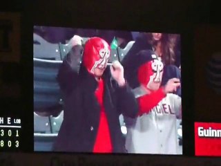 Angels game masked crowd.