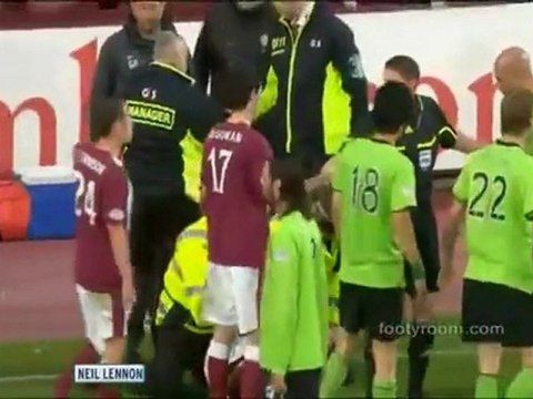 Celtic Manager Neil Lennon attacked by Hearts fan