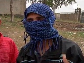 Fosse cumuni nel sud della Siria, il governo nega