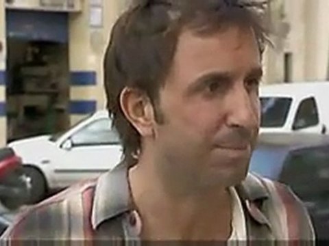 TV3 - Polònia - Un indigent demana un euro a Solbes