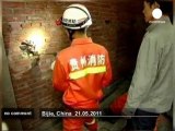 Firefighters rescue Chinese boy trapped... - no comment