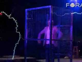 Sparks Fly as Caged MythBuster Adam Savage Busts a Move