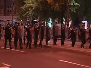 Pro-Mladic protesters clash with riot police