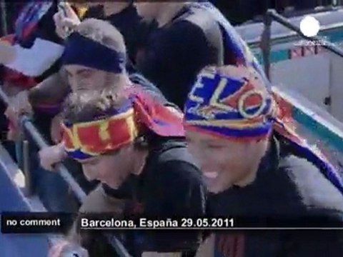 Adoring fans greet returning FC Barcelona - no comment