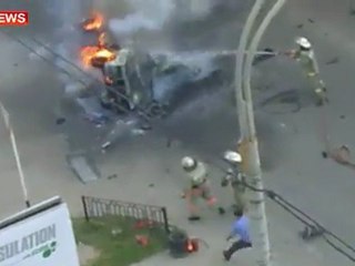 Crashed car blowing up