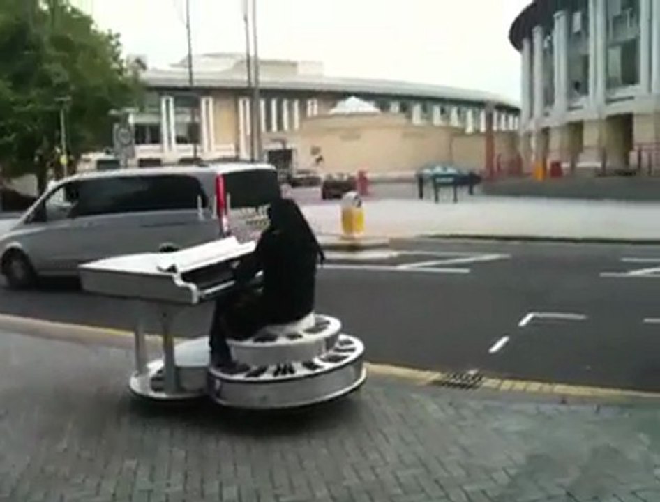 Crazy Piano man on wheels