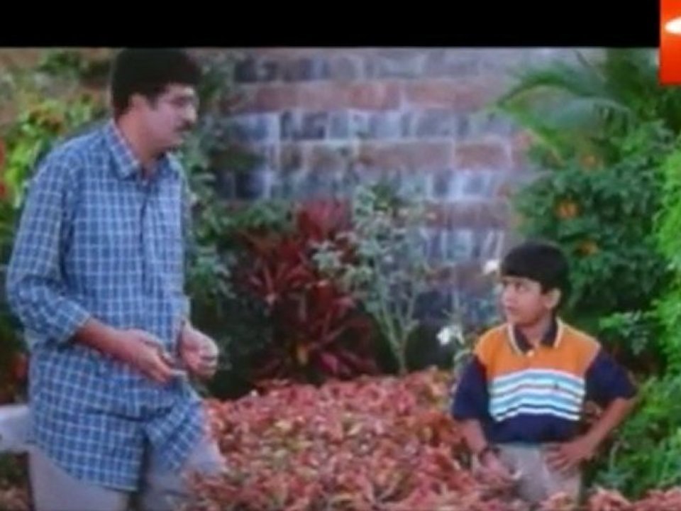 Son smoikng Cigarette with Father