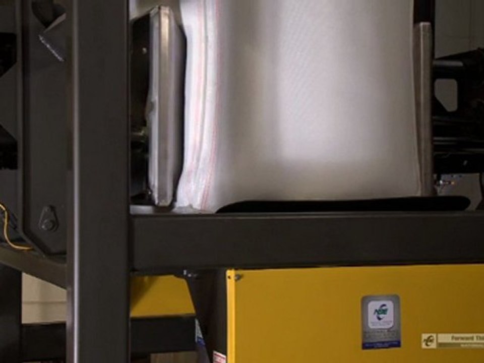 Bulk Bag Unloader with Bulk Bag Conditioning Deblocking Rams