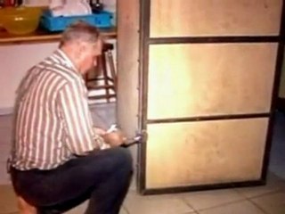Bolivian imprisoned in box by father