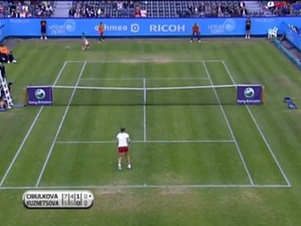 Cibulkova overcomes rain to reach semis