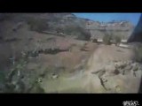 Dirtbike falls off edge of cliff