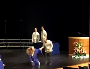Girl Falls At Graduation Trying To Do The Running Man