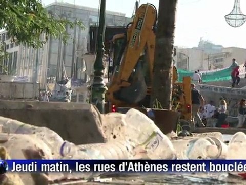 Athènes: la nuit tombe, les affrontements continuent