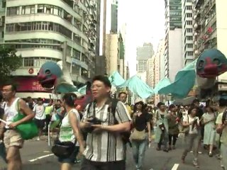 Thousands march on Hong Kong handover anniversary