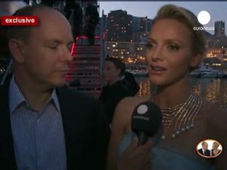 Prince Albert II and Princess Charlène of Monaco assist...
