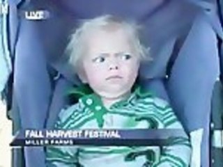 Reporter Makes Baby Cry on Live TV