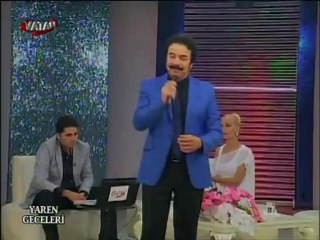 TANJU  TAYFUR  NİSAN YAĞMURU