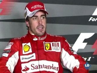 Fernando Alonso contento tras la victoria en Monza
