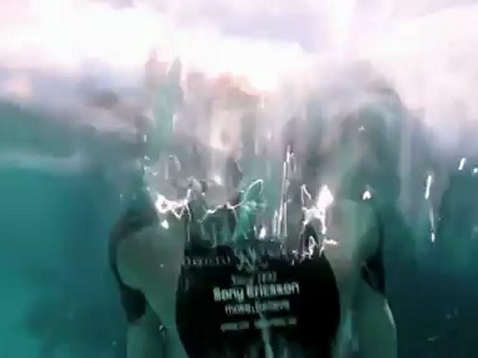 Guillaume Nery base jumping at Dean s Blue Hole by Julie Gautier