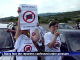 Georgian journalists protest outside a prison