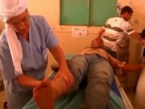 Rebels say Gaddafi uses civilians as shields