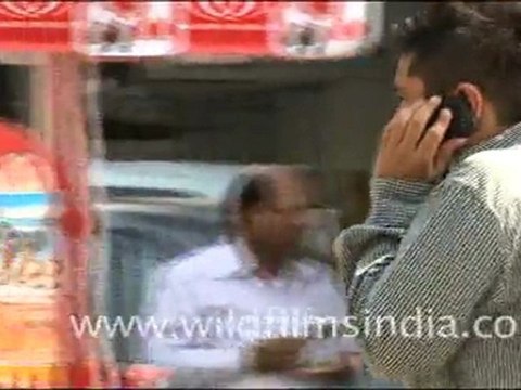 People speaking on cell phones