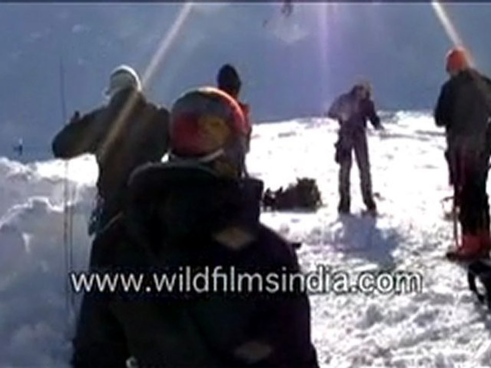 Mountaineers Making An Igloo