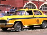 Howrah Railway Station and yellow Kolkata cab