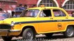 Howrah Railway Station and yellow Kolkata cab