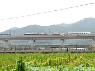 China revises train crash toll to 36