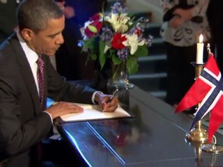Obama signs condolence book over Norway attacks