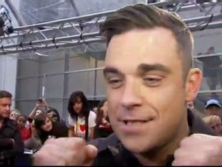 Robbie Williams makes 'sick' noises