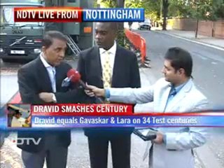 Broad brings England back after Dravid ton