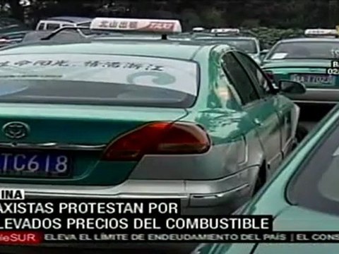 Taxistas en China protestan contra altos precios de gasolina
