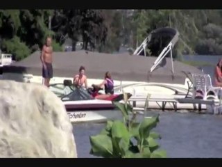 Miley Cyrus & Liam Hemsworth Riding A Jet Ski In Orchard Lake, Michigan - July 31, 2011