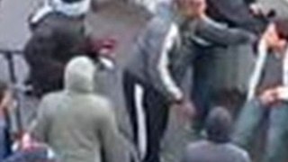 London riots: bleeding boy robbed by passers-by