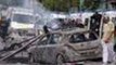 London riots: bleeding boy robbed by passers-by -